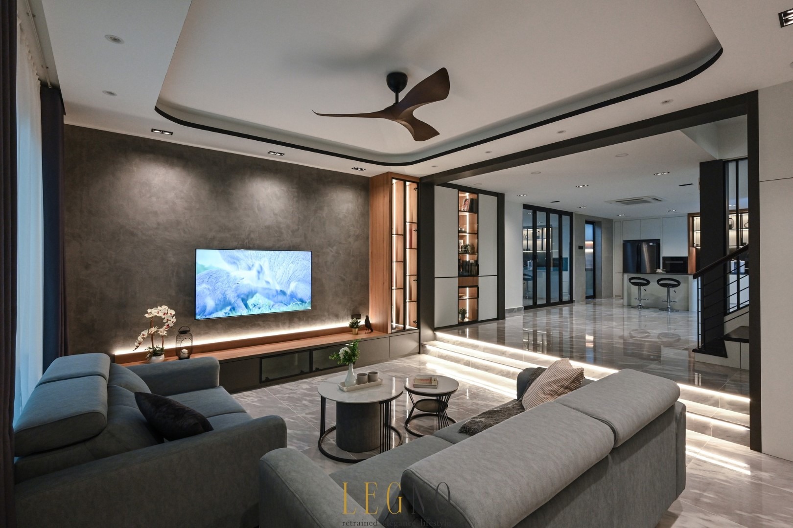Modern Semi-D living room interior with cozy lighting and contemporary decor in Taman Bukit.