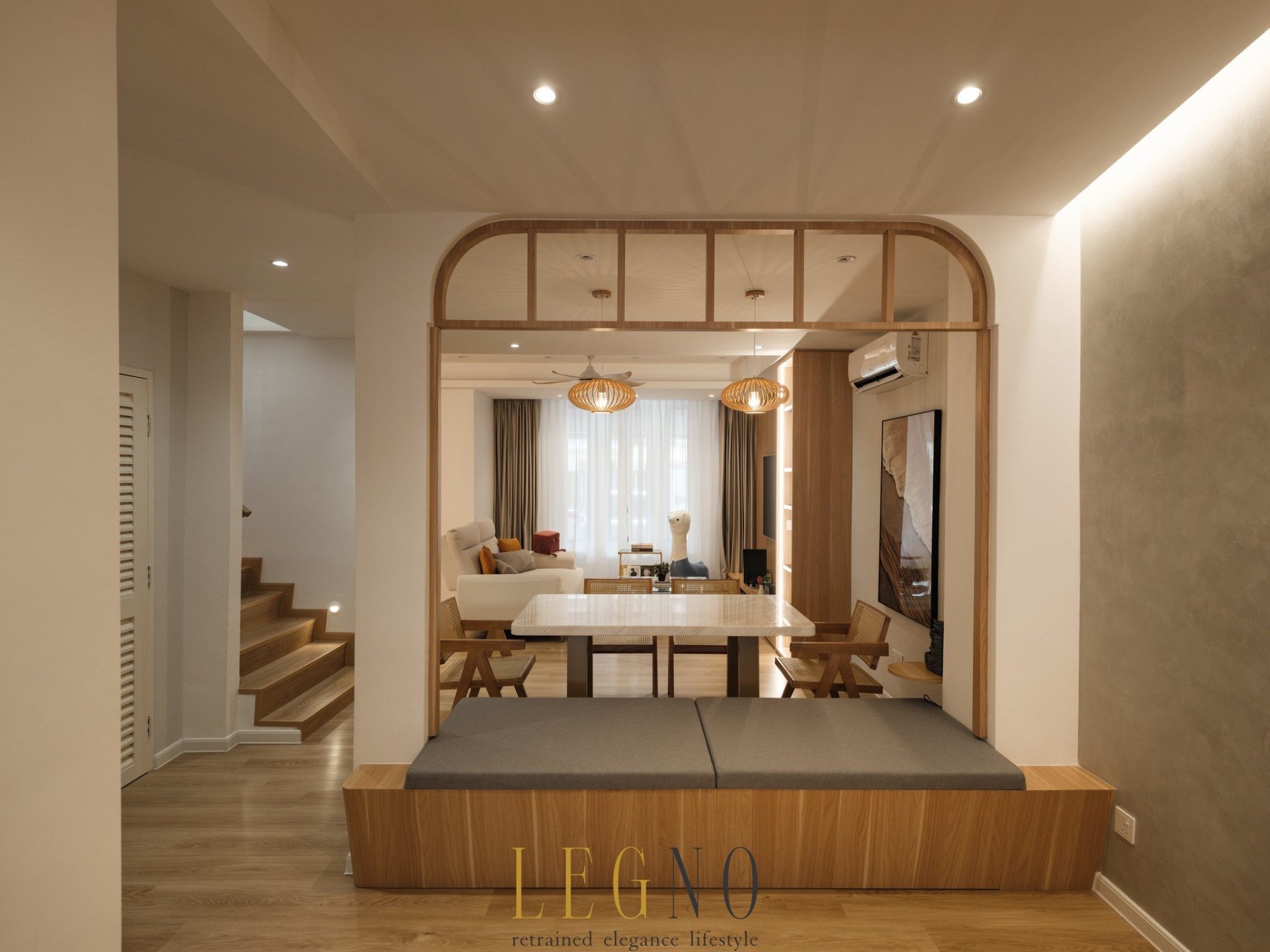 Minimalist MUJI-style living room in Penang featuring light oak furniture and an open-concept layout.
