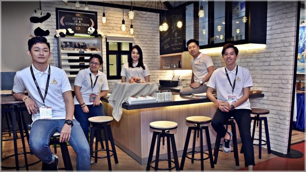 The dynamic Legno interior design team collaborating in their modern Penang office.