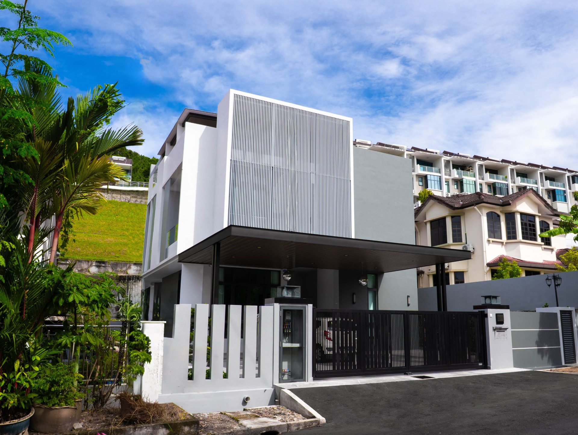 Contemporary three-storey residential interior design in Penang featuring modern living spaces by Legno Interior.